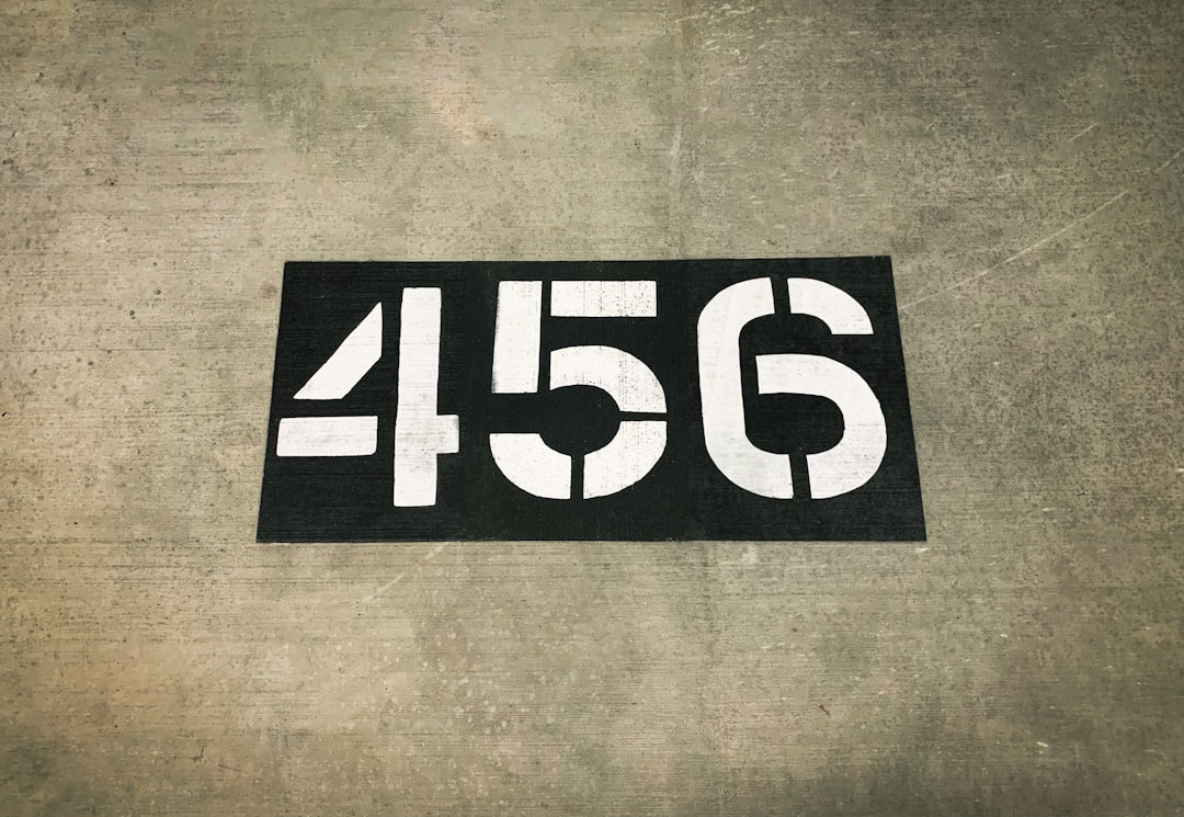 a black and white sticker with the number 450